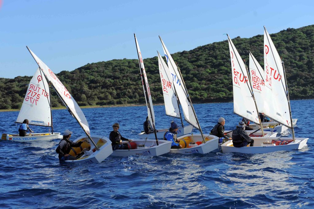 çocuk gelişimi, deniz sevgisi, doğa ve spor, karar verme, optimist yelken, özgüven, sağlıklı çocuklar, sporla büyüme, Yelken sporu, yelken yarışları